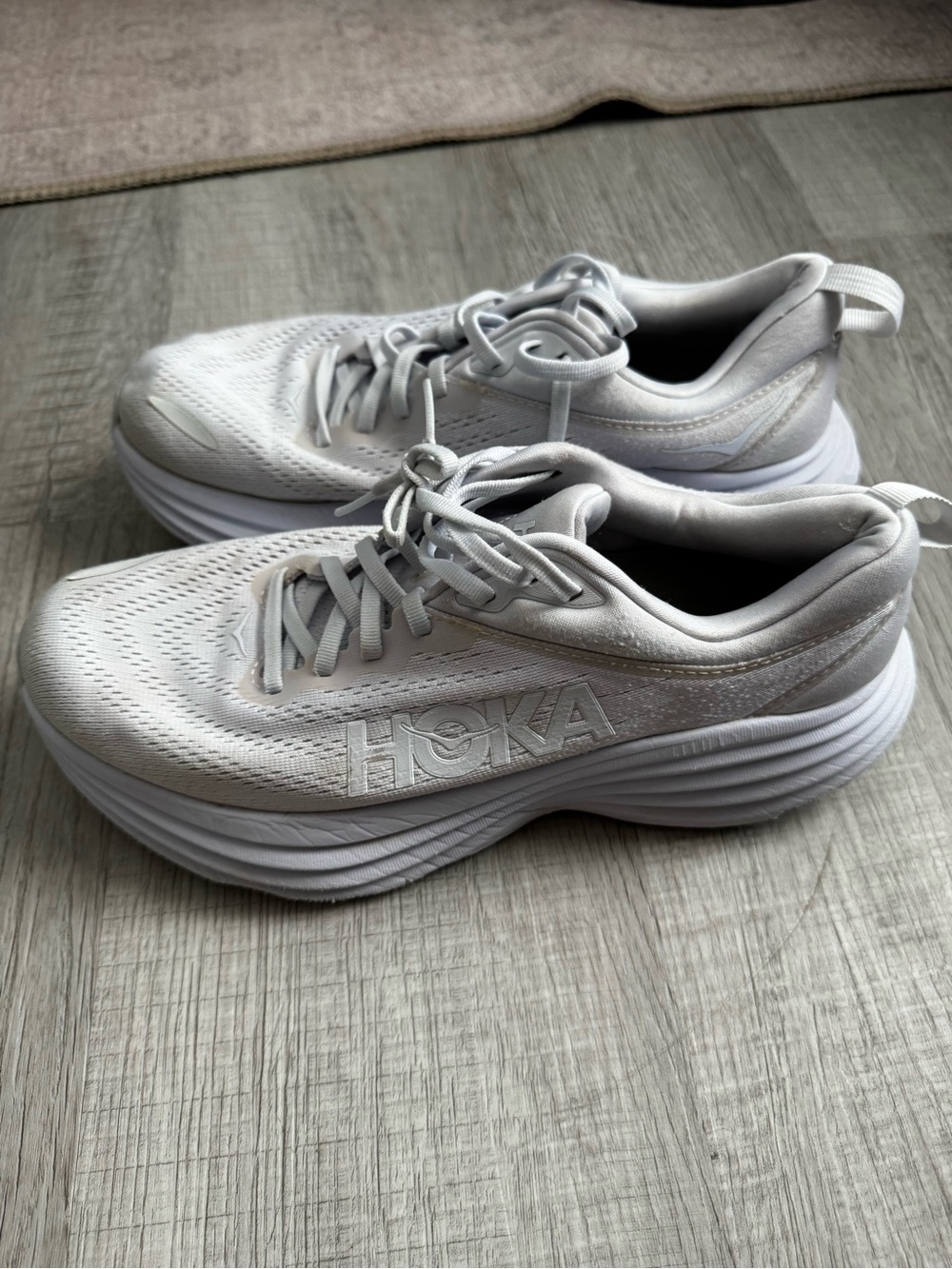 Hoka Women's White Athletic Running Shoes with Elevated Cushioning